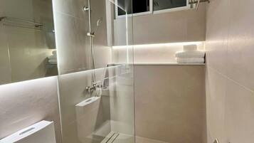 Hair dryer, bidet, towels, soap