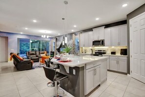 Fridge, microwave, oven, stovetop - Disney Dream Home 7BR/6.5Ba Themed Rooms Game Loft (Kissimmee)