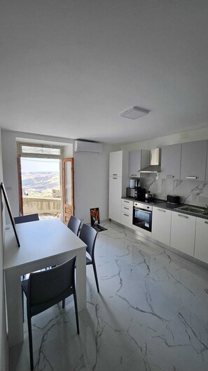 Dining - Modern Hillside Retreat with Panoramic Views & Private Balcony with AC (Mussomeli)