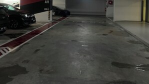 A parking garage with a sign indicating directions to the lobby and A11. - becentral residence i-city (Shah Alam)