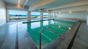 An indoor swimming pool with clear views of the beach and ocean. - Studio on the 4th floor with sea view (Middelkerke)