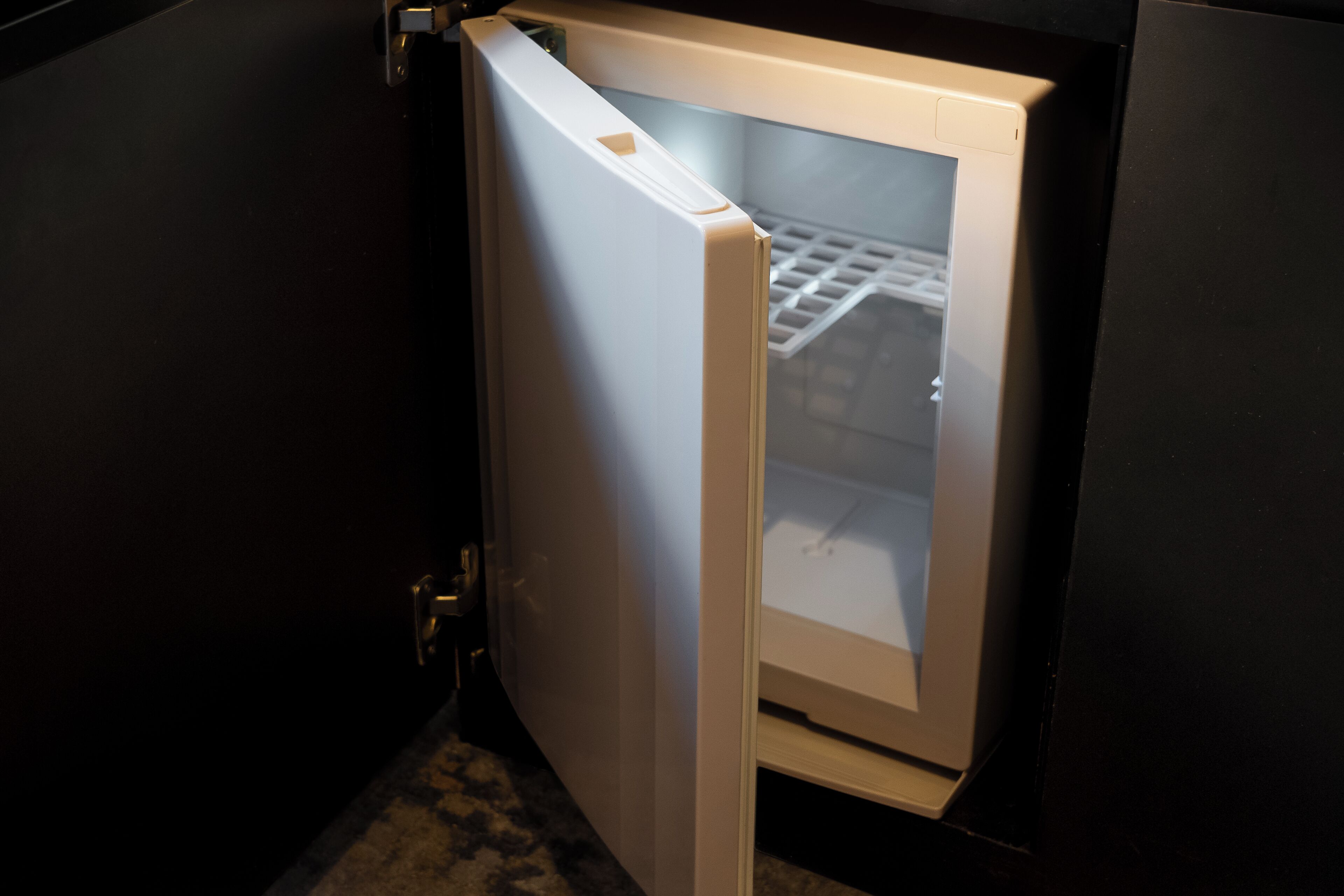 A refrigerator with a freezer compartment visible.
