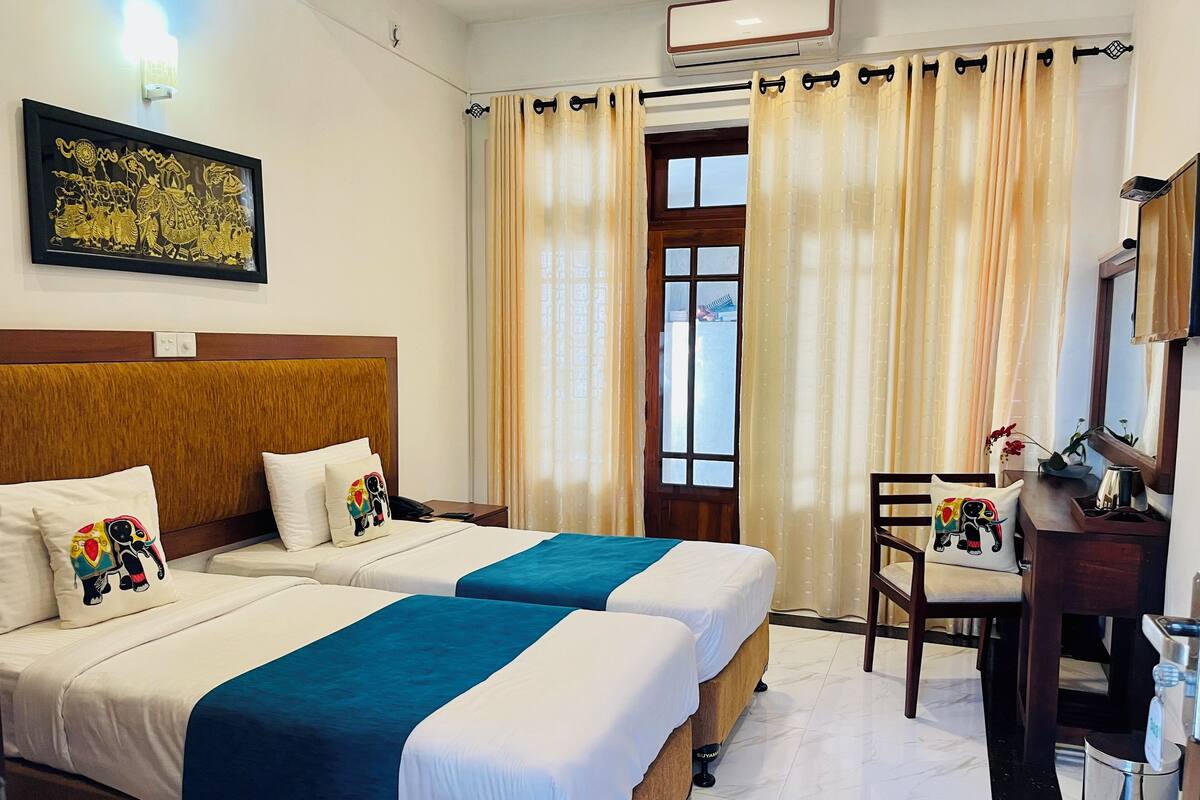 Deluxe-værelse med 2 enkeltsenge | Pengeskab på værelset, strygejern/strygebræt, gratis Wi-Fi