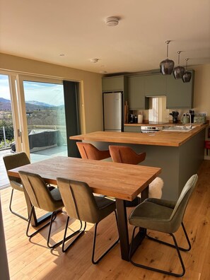 Private kitchen - Sunny Ridge is a modern, open-plan, sustainable bungalow, with stunning views. (Fort Augustus)