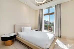 Apartemen Deluks, 2 kamar tidur, pemandangan laut terbatas | Setrika/meja setrika dan Wi-Fi gratis