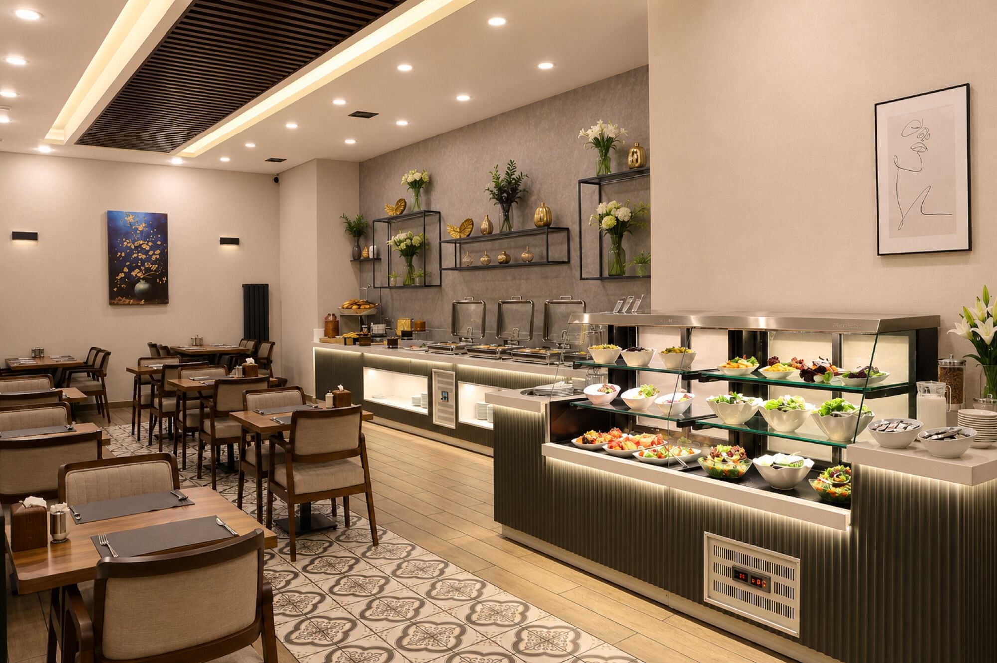 A modern restaurant with a buffet counter, dining tables, and chairs.