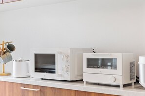 Apartamento Deluxe, balcón, vistas parciales al mar | Interior