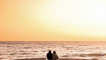 Appartement Deluxe, balcon, vue partielle sur l'océan | Plage