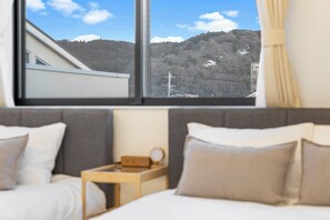 Deluxe Apartment, Balcony, Partial Ocean View | Down comforters, blackout drapes, free WiFi, bed sheets - Zushi Beach Terrace  (Zushi)