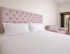 1 slaapkamer, een strijkplank/strijkijzer, internet, beddengoed