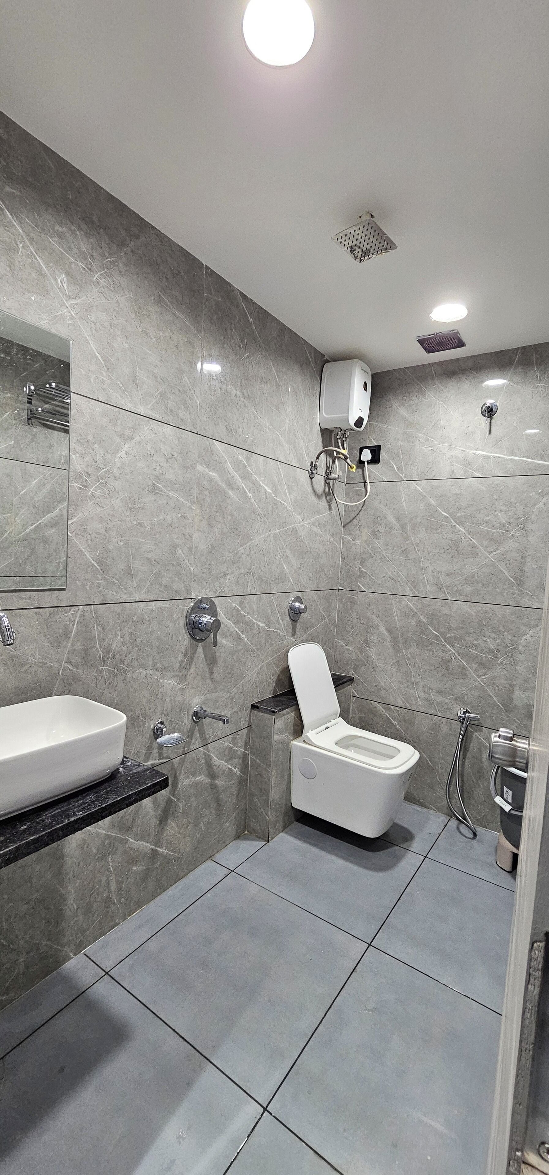 ห้องดีลักซ์ดับเบิล, วิวเมือง | ห้องน้ำ | ของใช้ในห้องน้ำฟรี, รองเท้าสวมภายในห้อง, ผ้าเช็ดตัว, สบู่