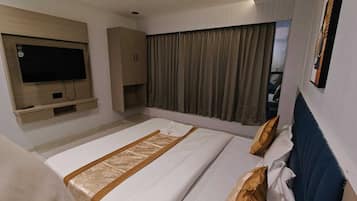 Deluxe Double Room, City View | Desk, laptop workspace, iron/ironing board, free WiFi