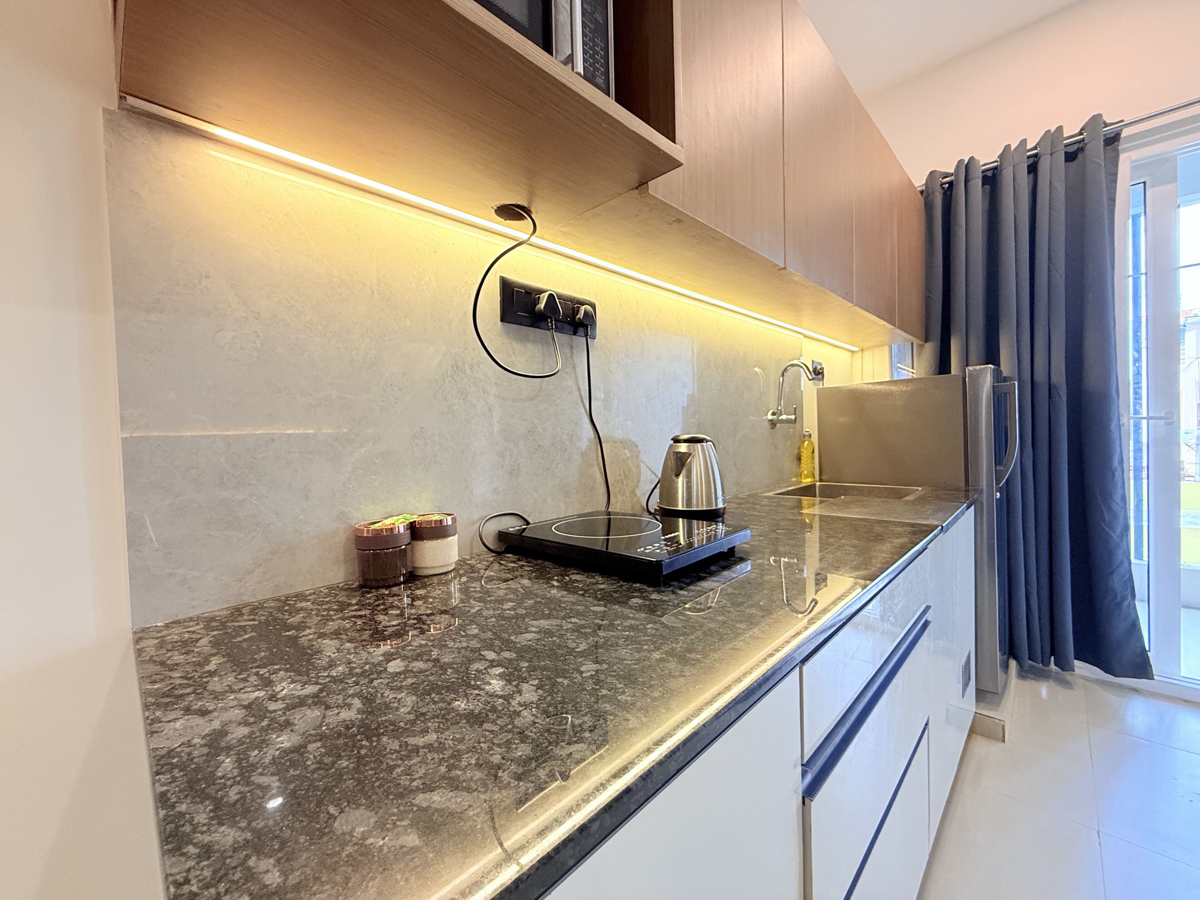 Premium Studio, Non Smoking, City View | Private kitchen | Full-sized fridge, microwave, cookware/dishes/utensils