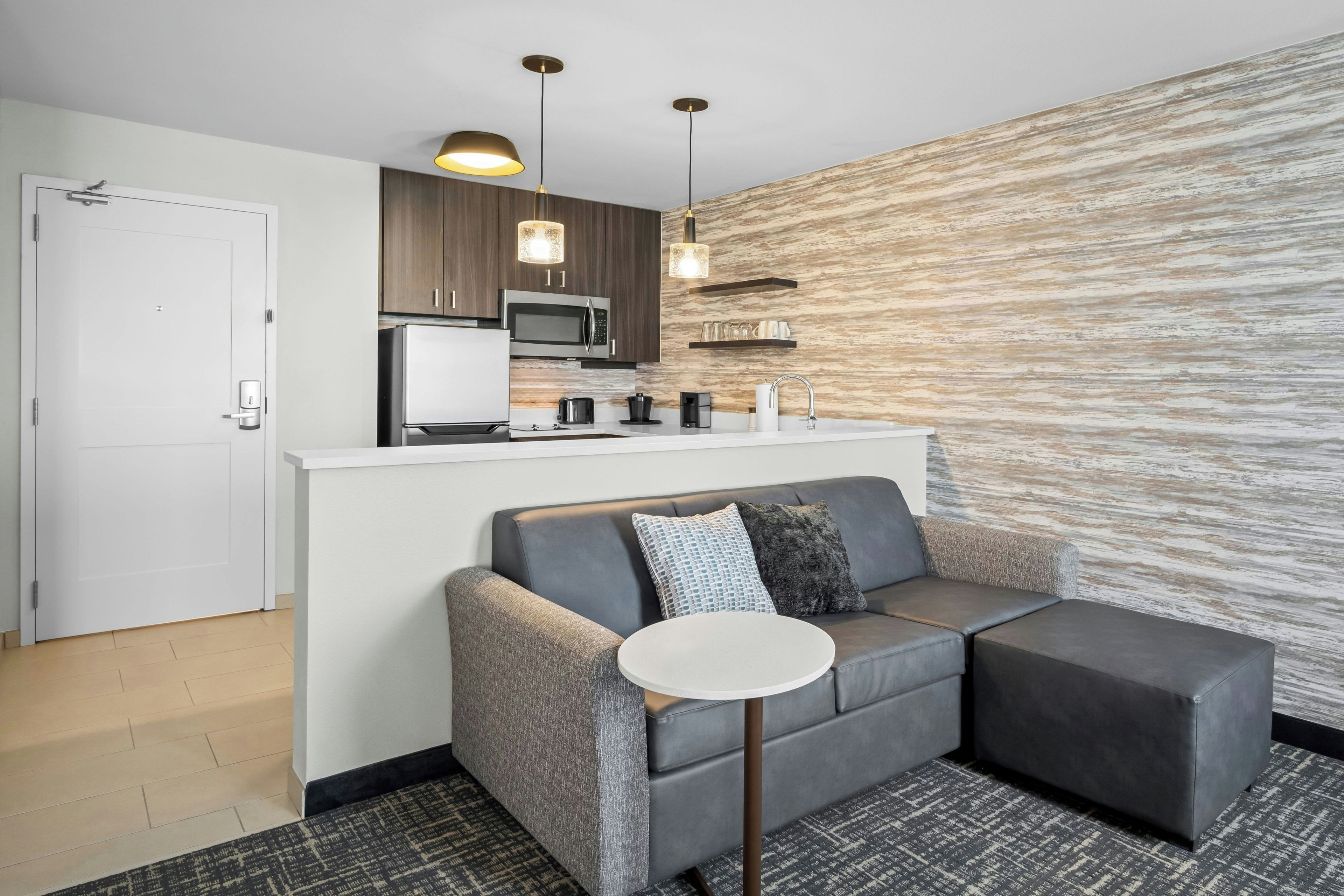Studio Suite, Multiple Beds, City View | Living area | 55-inch LED TV with cable channels, Netflix, Hulu
