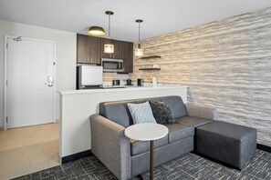 A modern kitchenette with a microwave, coffee maker, and a small refrigerator. - Residence INN BY Marriott Waxahachie (Waxahachie)