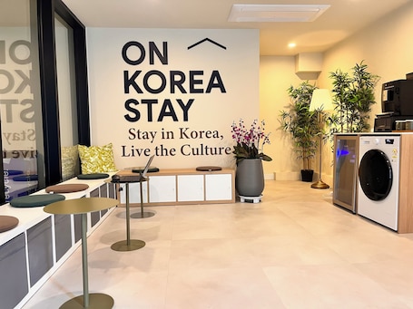 Mini-fridge, microwave, dining tables. OnKorea Stay