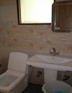 Shower, free toiletries, towels, soap