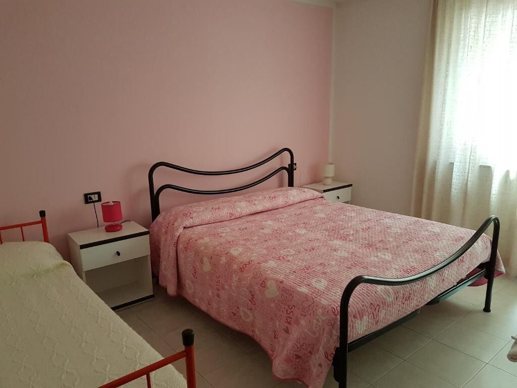 Appartamento, vista lago | Tende oscuranti, ferro/asse da stiro, Wi-Fi gratuito