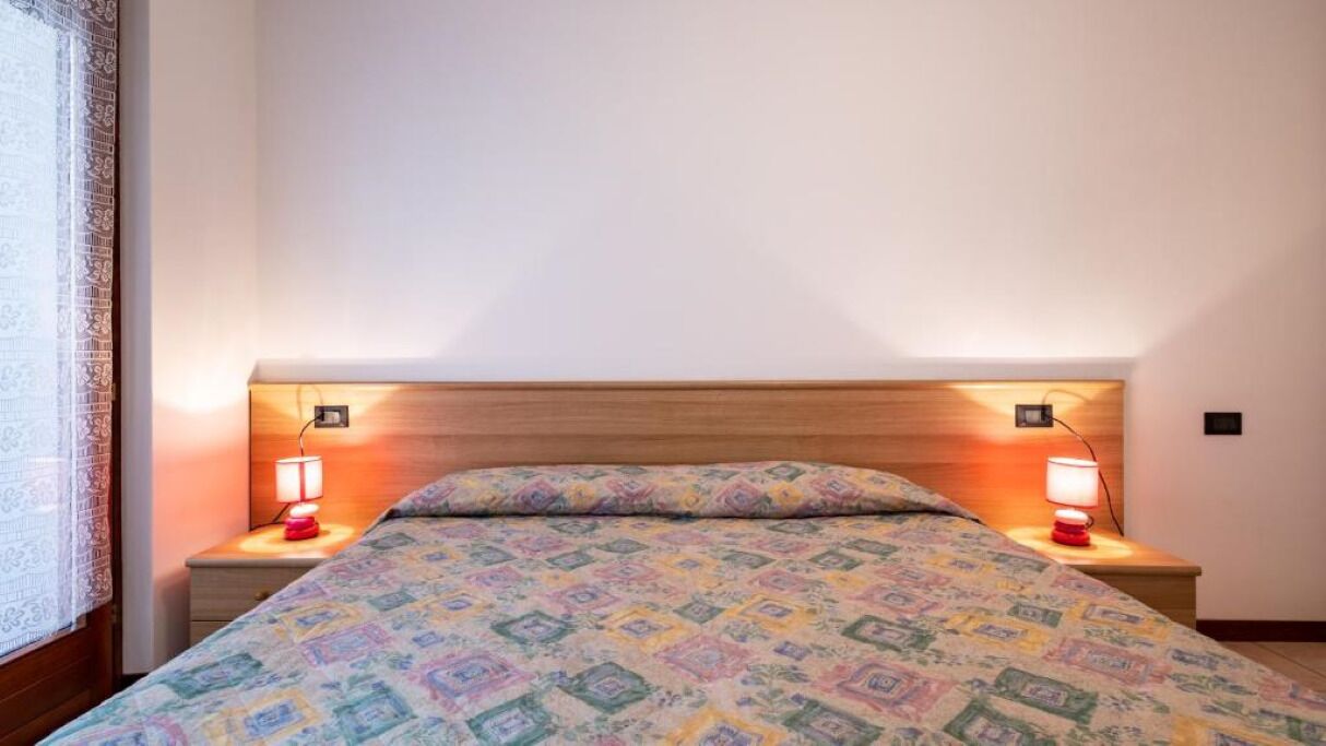 Appartamento, vista lago | Tende oscuranti, ferro/asse da stiro, Wi-Fi gratuito