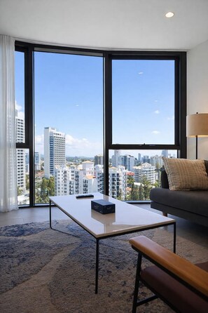 TV - Modern 2BR Coastal Stay in Broadbeach with Pool (Broadbeach)