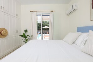 2 habitaciones, tabla de planchar con plancha y cuna de viaje 