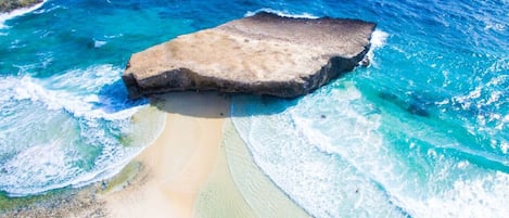 On the beach, sun-loungers, beach towels