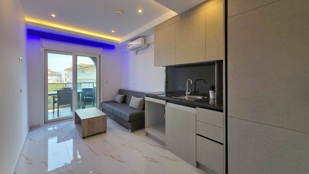 Living area - Alexandros Two-Bedroom Deluxe Suite n. 11 (Paralia)