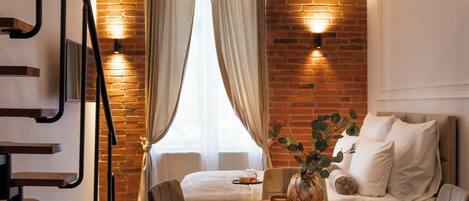 Superior Studio Suite, Mezzanine | Living area | Flat-screen TV