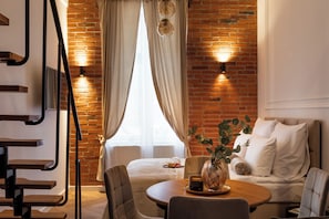 Superior Studio Suite, Mezzanine | Living area | Flat-screen TV - L23 Boutique by Downtown Apartments (Kraków)