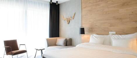 Deluxe Double Room, Garden View | In-room safe, desk, laptop workspace, blackout drapes