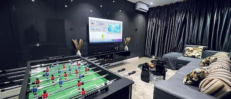 Economy Apartment, Balcony, City View | Game room