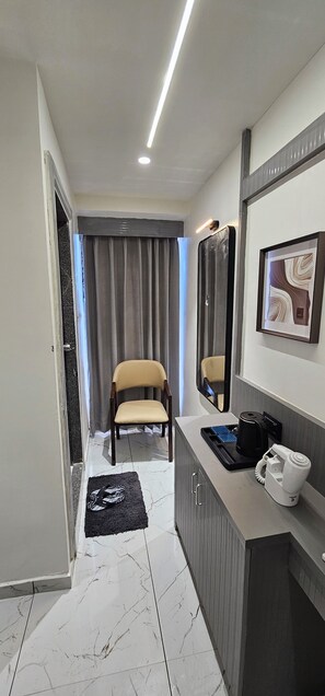 Desk, laptop workspace, iron/ironing board, free WiFi - Hotel Maple Town (Ahmedabad)