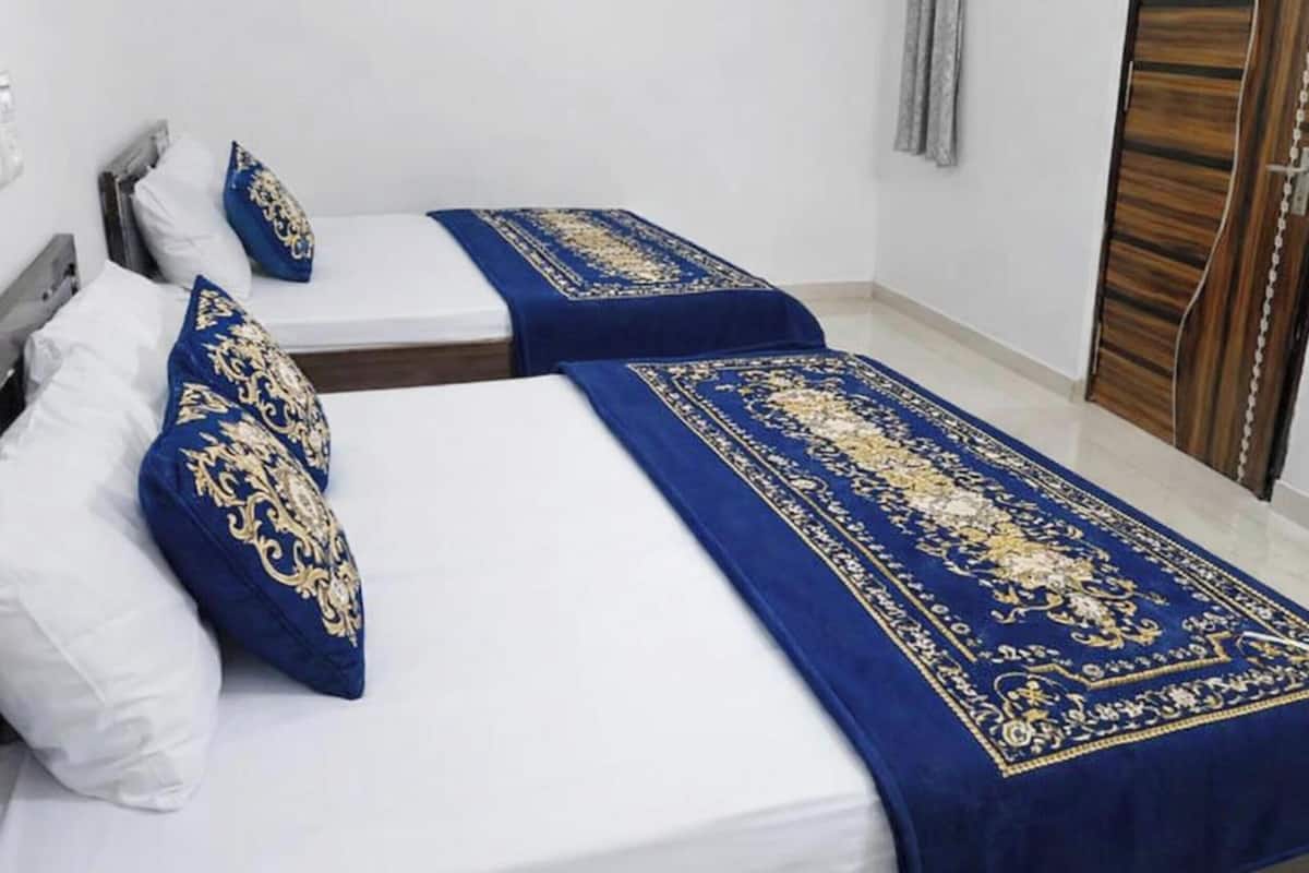 Deluxe Quadruple Room, Penyaman udara | Pemandangan dari bilik