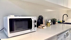 Apartemen Basic, balkon | Dapur pribadi