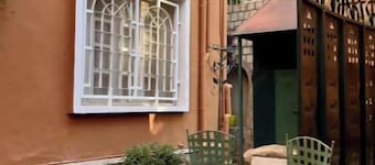 In the heart of Tana, view of the Queen's Palace, near Barea Stadium, in safety