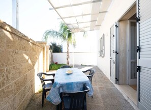 House, 1 Bedroom, Smoking, Garden View | Outdoor dining - Oasi Garden House Villetta Moderna con Giardino e Parcheggio Privato (Porto Cesareo)