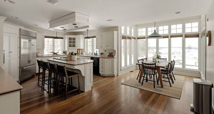 Legacy Lane Retreat sleeps up to 14 with tennis courts, pickleball courts, shuffleboard, fishing pond & more.