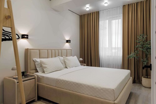 Modern 2-BR, Balcony-View Apartment with Coffee Station and more - GrandStay