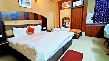 Premium bedding, desk, laptop workspace, soundproofing