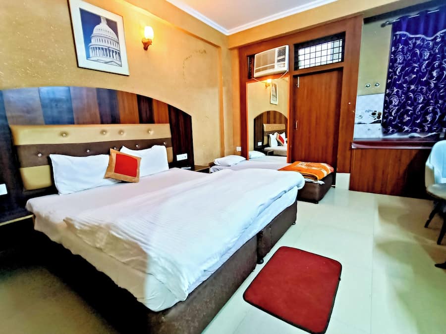 Premium bedding, desk, laptop workspace, soundproofing