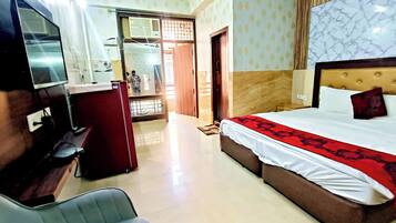 Premium bedding, desk, laptop workspace, soundproofing