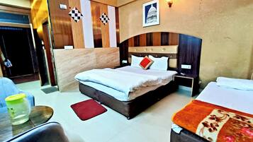 Premium bedding, desk, laptop workspace, soundproofing