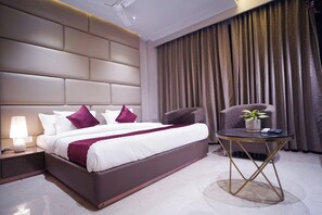 Executive Room, City View | Desk, laptop workspace, blackout drapes, iron/ironing board - Trevon Siya Ramaya Inn (Gwalior)