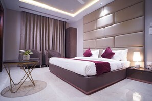 Premium Room, City View | Desk, laptop workspace, blackout drapes, iron/ironing board