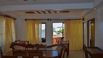 Family Apartment | Living area | 32-inch Smart TV with digital channels