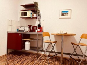 Kahden hengen deluxe-huone, kaupunkinäköala | Ruokailu