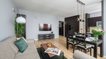 Comfort Apartment | Living area | 40-inch LCD TV with digital channels