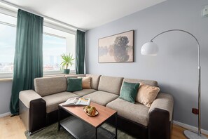 Apartamento conforto | Área de estar | TV LCD 40 polegadas com canais digitais