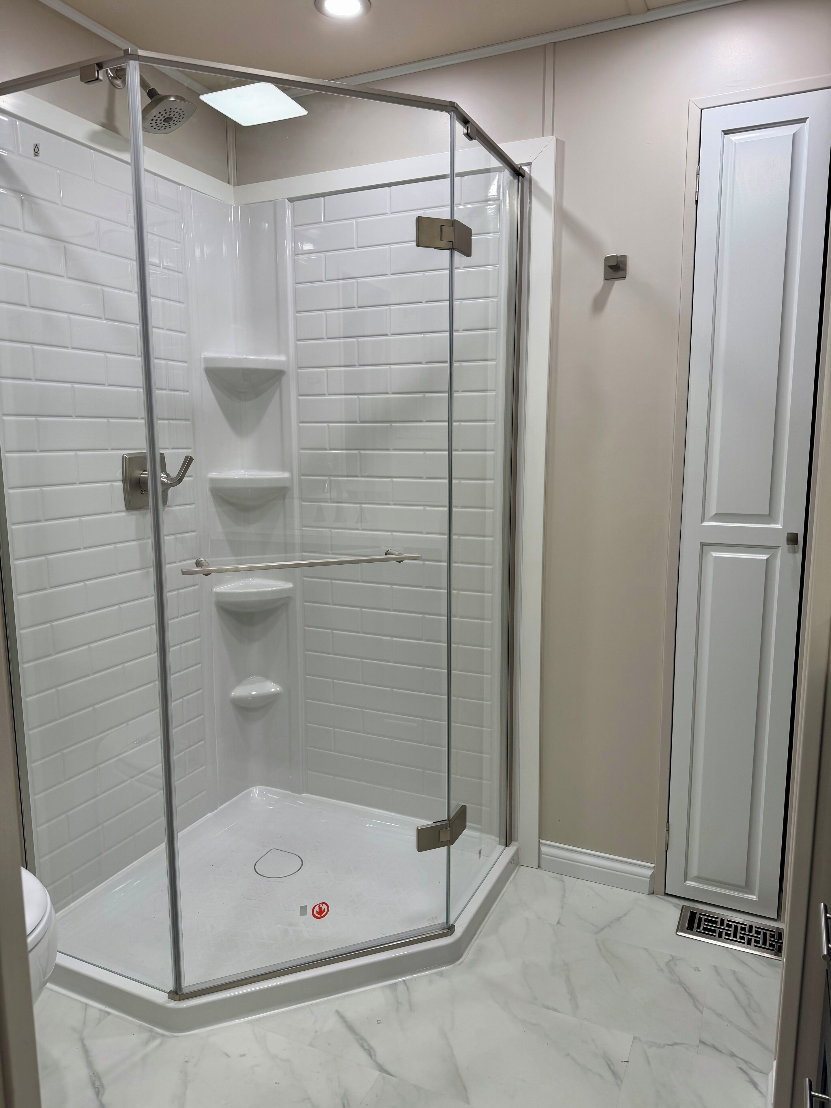 Shower, hair dryer, towels, toilet paper