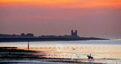 Stylish 2-bed seaview apartment in Ramsgate’s Royal Harbour. Sleeps 4, with private garage parking. Enjoy coastal walks, cafes, and stunning sunrise and sunsets from your own retreat — perfect for couples, families, or a relaxing seaside escape.